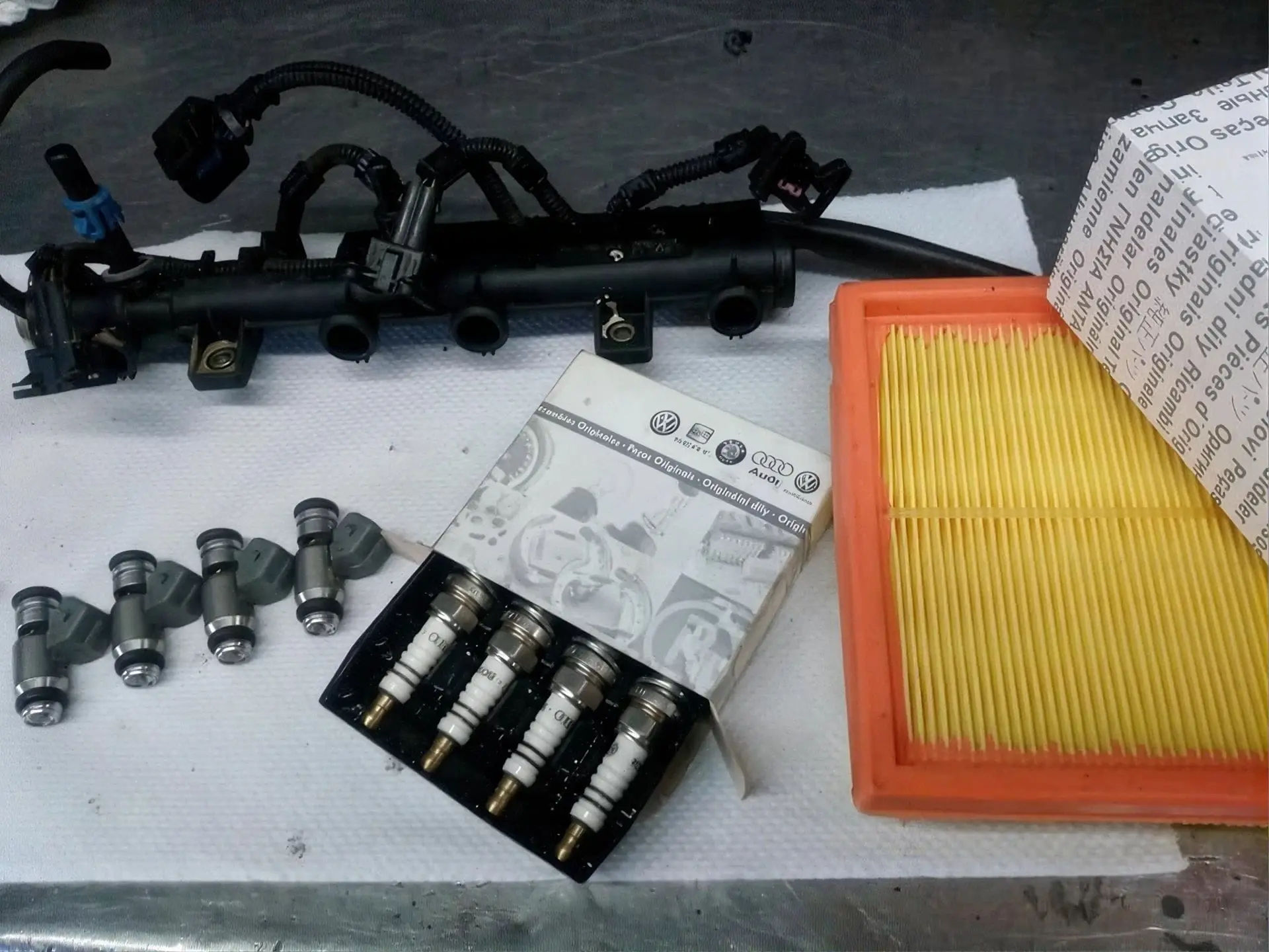 Piezas de inyección, bujías y filtro de aire originales listos para instalar